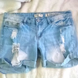 Ripped light blue jean shorts